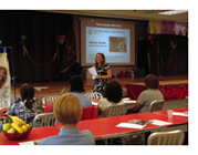 Donna Musil talks to day care 
                            providers