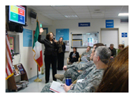 Donna Musil & Dr. Paulette 
                            Bethel address the Vicenza Hospital staff